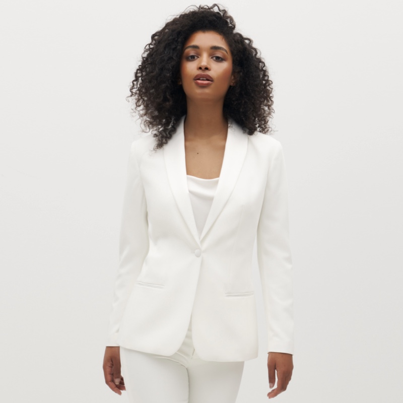 woman in white suit